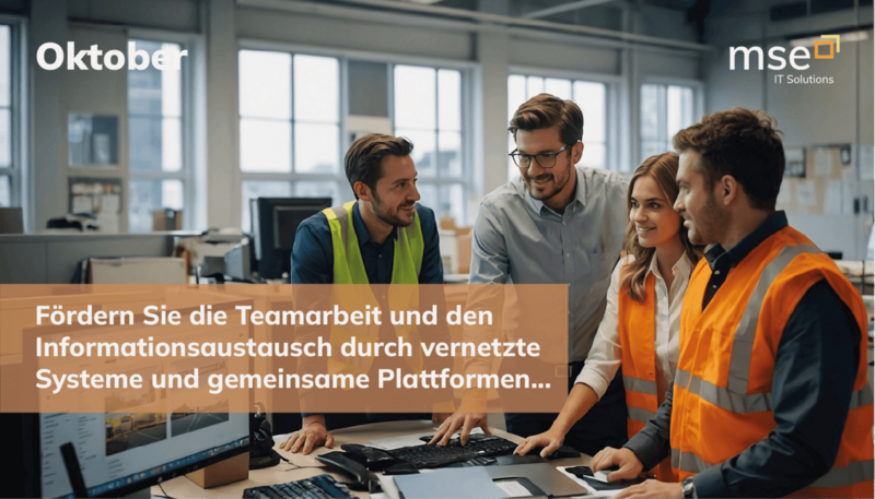 Mehrere Personen in Warnwesten stehen um einen Tisch mit Laptops in einem modernen Büro mit großen Fenstern.